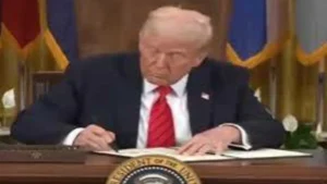 President Donald Trump signing the executive order to eliminate the U.S. Department of Education on March 20, 2025, which may impact on bootcamp loans funding and vocational education.